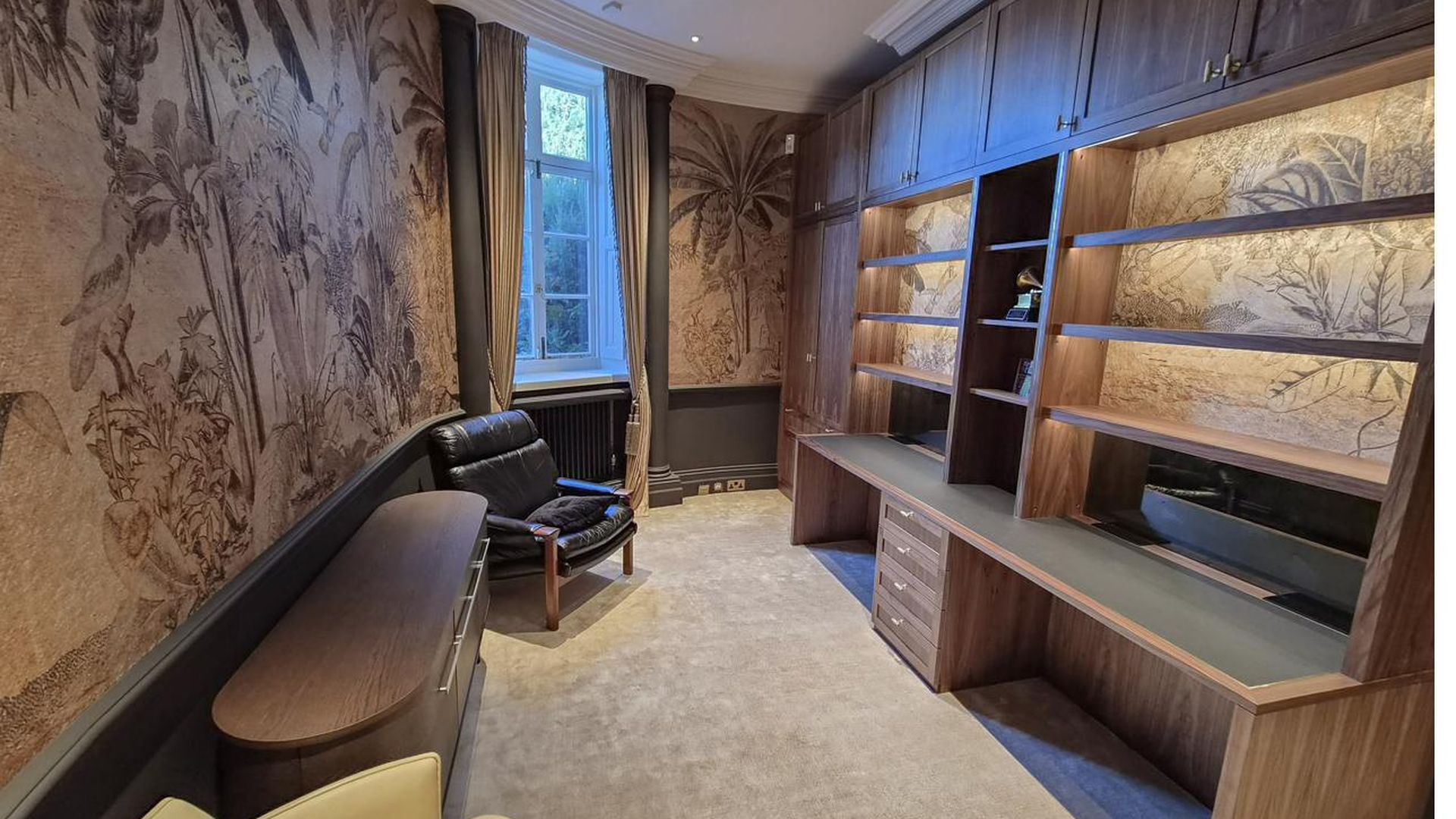Built-in desk and shelving, private study