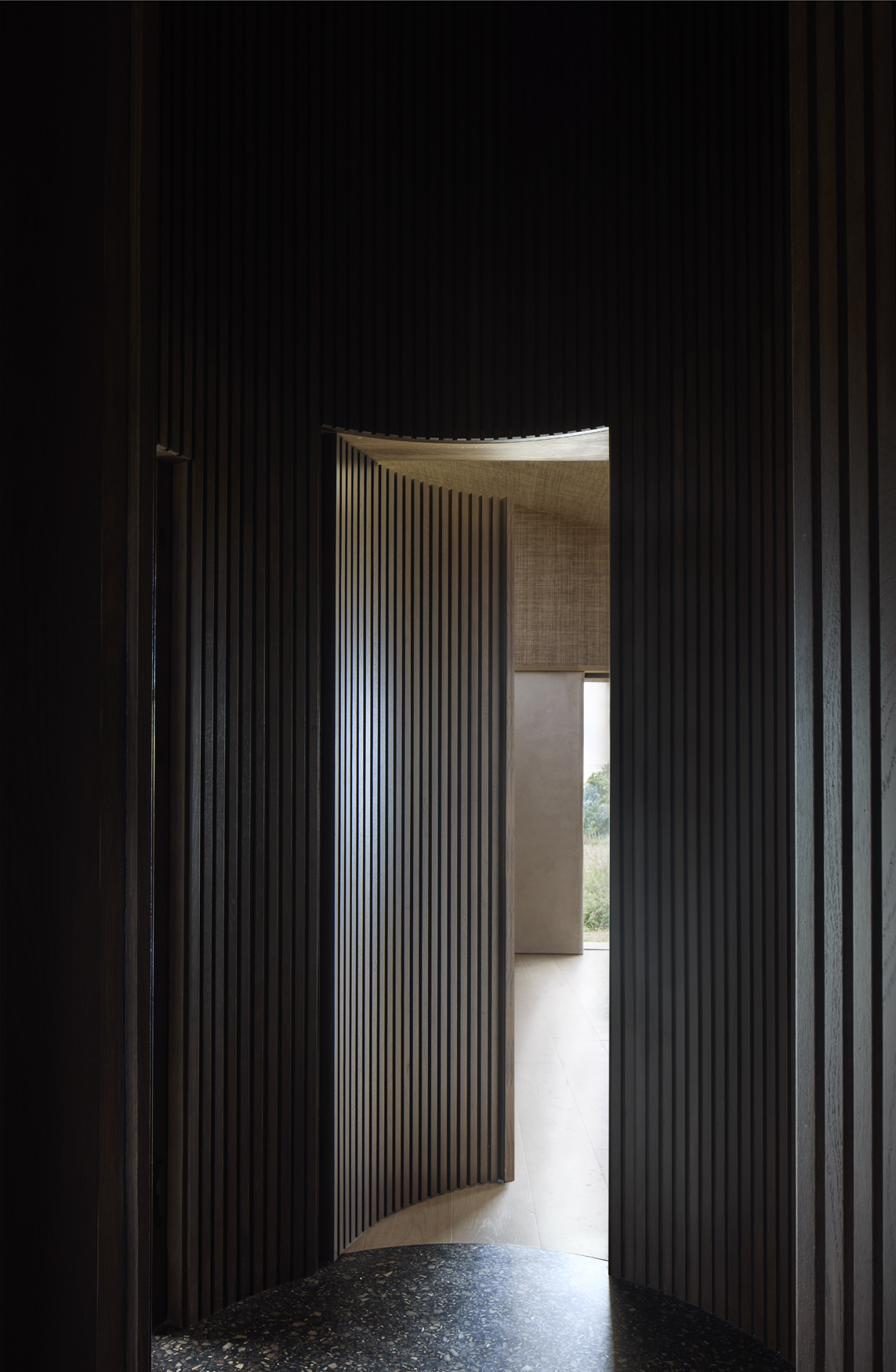 Fluted oak passageway, private residence