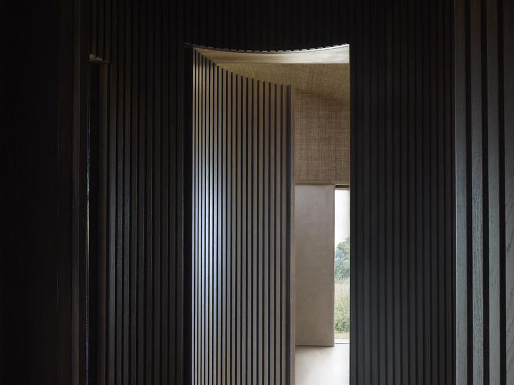 Fluted oak passageway, private residence